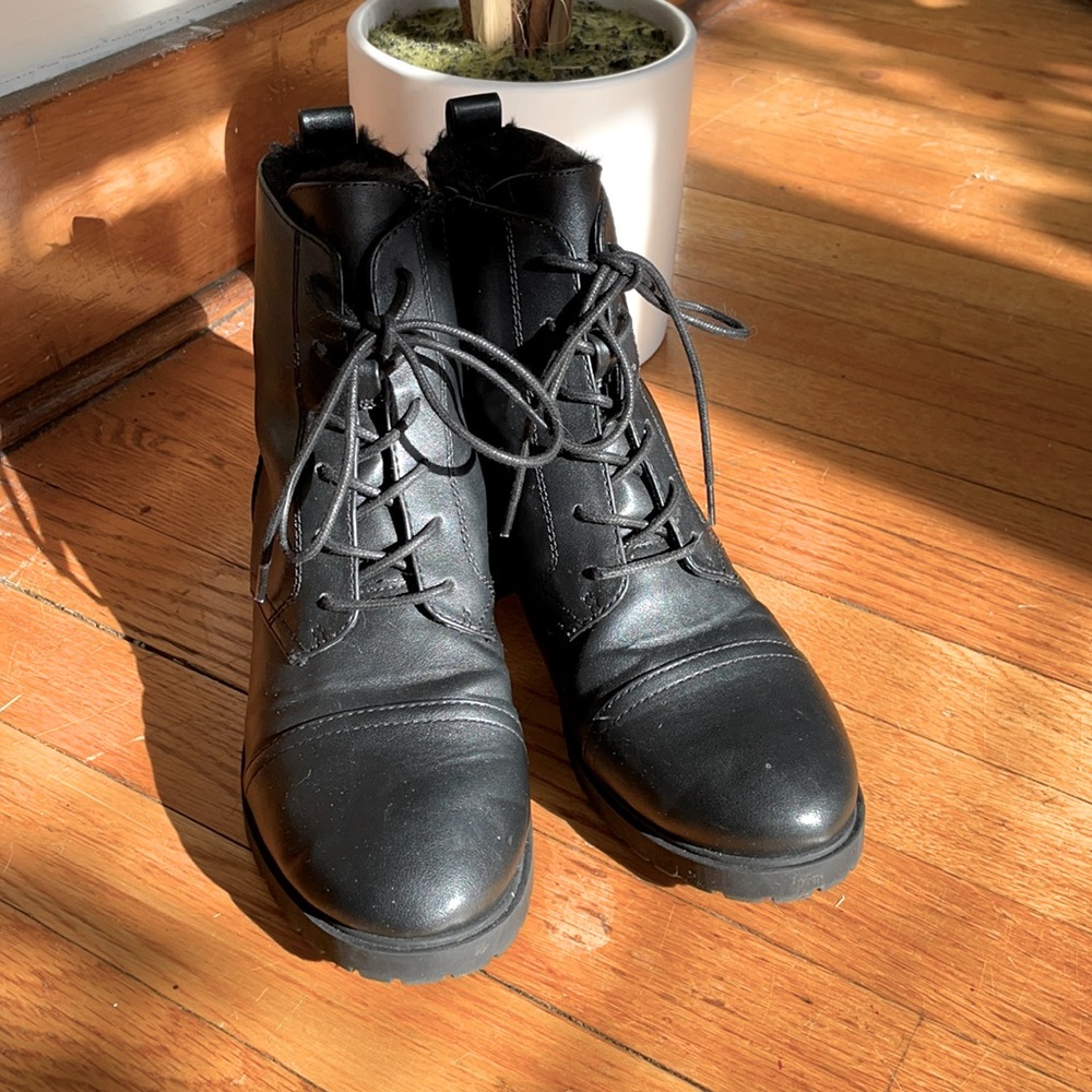 Black tie up combat boots